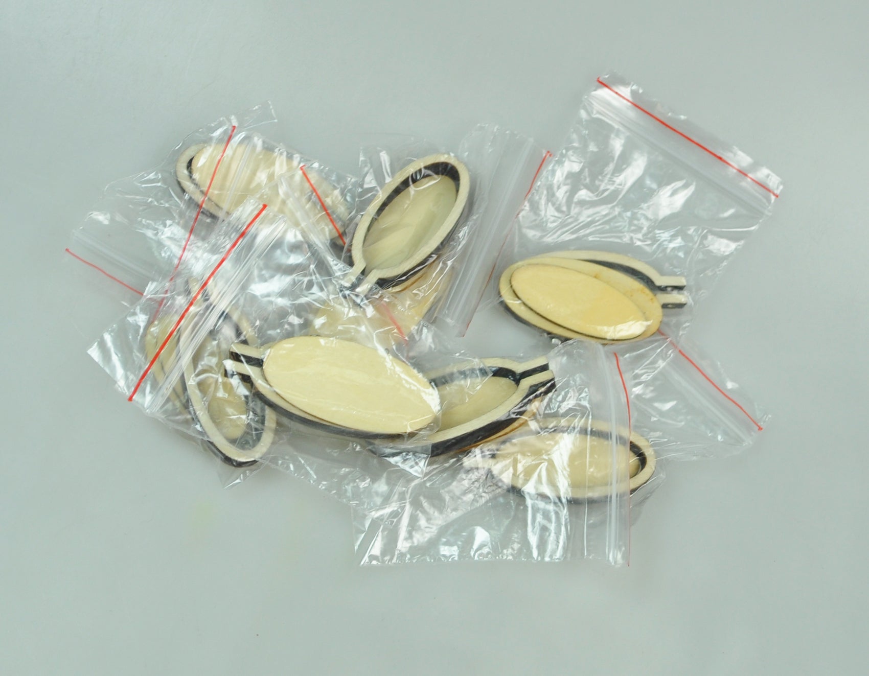 OVAL WOOD EMB.FRAME:10SETS/PK (OV/MINI EF-4.8X2.2CM)